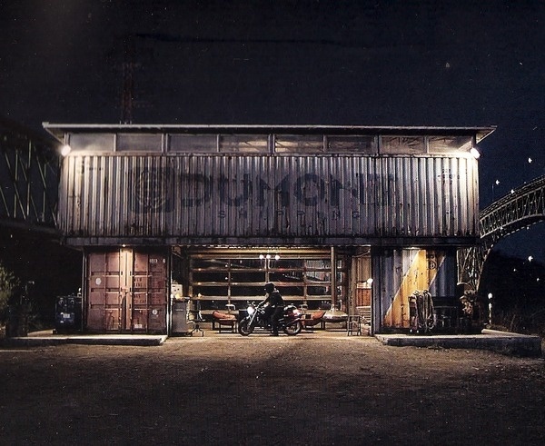 The things I would do to be able to live in multiple shipping containers like this. Just me, a Ducati, a dog, coffee, and books. #ducati #motorcycle #tron