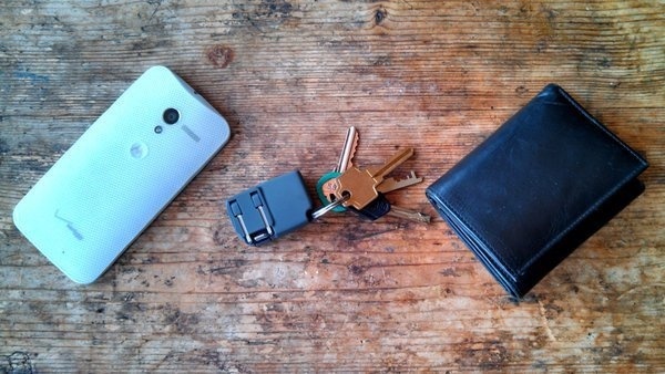 Chargerito is a tiny mobile device charger that can fit on your keychain and can be plugged into any outlet. #portable #design #travel #charger #product #industrial