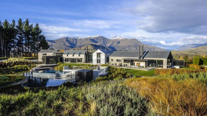 This luxurious alpine inspired villa boasts dramatic Lake and Mountain views, elegant furnishings and four plush bedrooms. Indoors there is a stone fireplace, open plan living/dining area that leads out to a spacious balcony. The balcony is the perfect place for taking in the most spectacular water views.