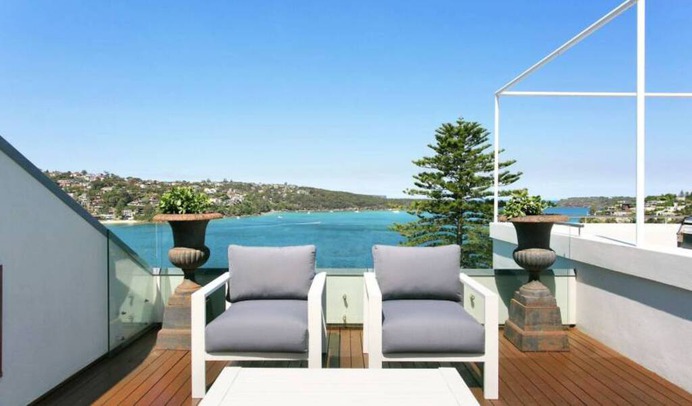 This spectacular beachfront home is an inspiring haven of luxury, boasting fantastic views over Middle Harbour and out to the ocean. Book with Villa Getaways.