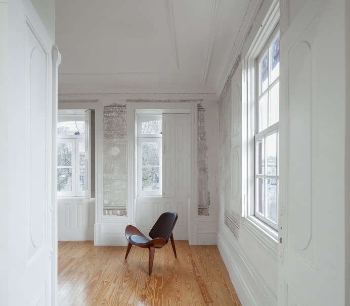 Two Houses in Largo do Trovador by Pitagoras Group. #wall #pitagorasgroup #minimalism #rehabilitation