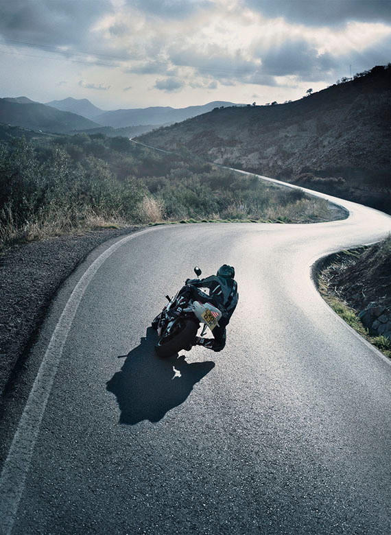 motorbike_rider_on_a_twisting_open_road #rider #motorbike #road