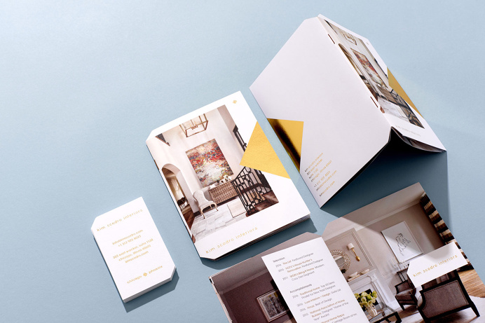 Knoed Creative / 16-page mini brochure with built-in pocket, die cut corners and gold foil stamp. #printdesign #brochure #goldfoil