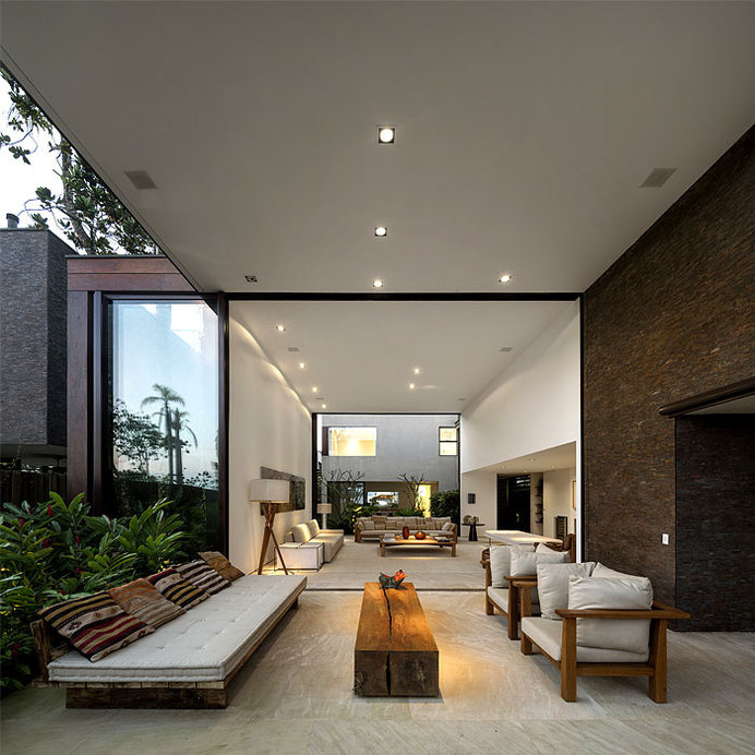 Luxurious and Sophisticated Spirit of Brazilian Weekend Home barbecue space retreat terrace #design #living #home #architecture #outdoor #room