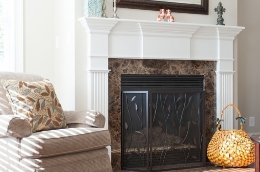 The Stratford Companies #design #living #home #marble #fireplace #room
