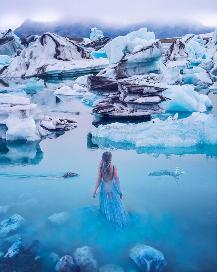 Kristina Makeeva Captures Girls in Dresses Set Against Magical Landscapes