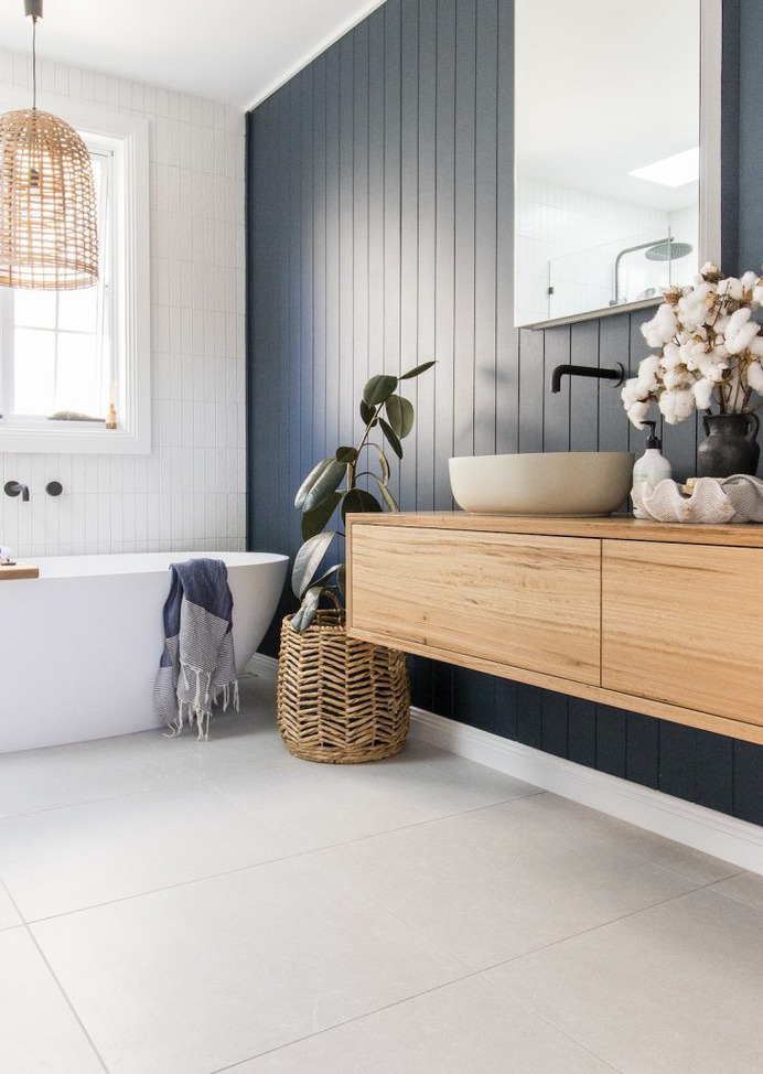 Room tour: A stunning deep blue, coastal luxe bathroom