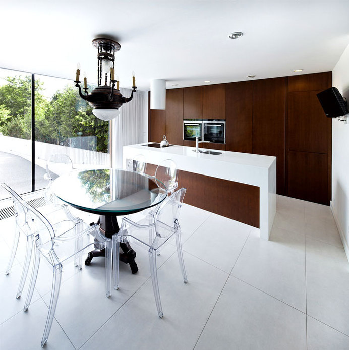 Perforated House Simple Cube with no Balconies kitchen black white dark wood #ideas #interior #kitchen #design