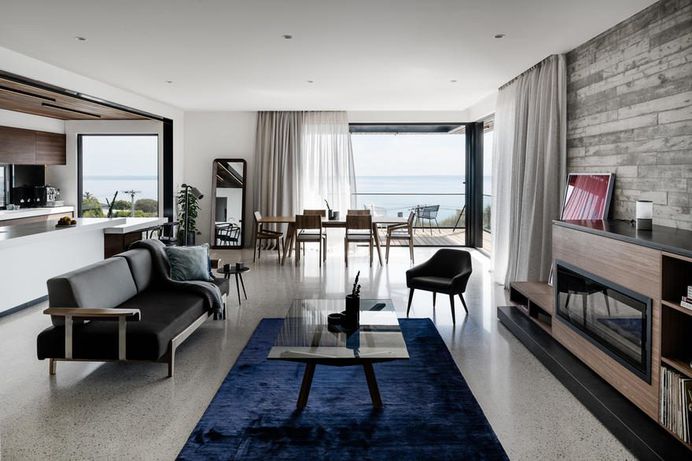 Two Angle House Featuring Provocative Architecture Using Concrete, Stone and Wood 9