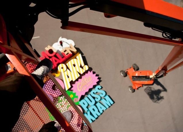 Cool 3D poster is made with letters so big that they can crush a human