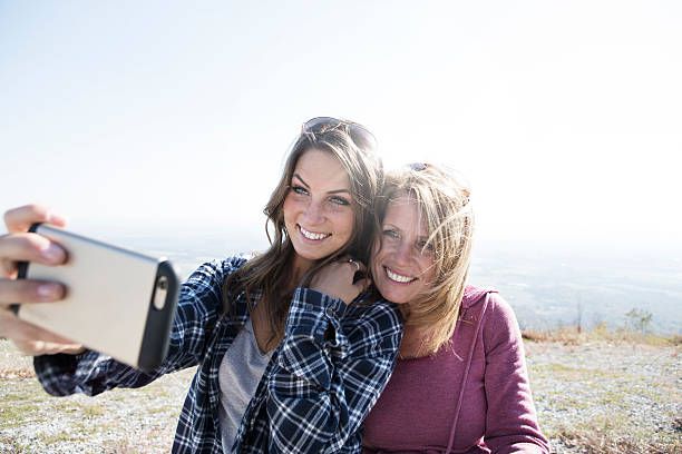 Mother and daughter taking a selfie
