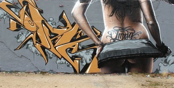 Erotic looking woman on graffiti street art #graffiti #realism #street #art #realistic
