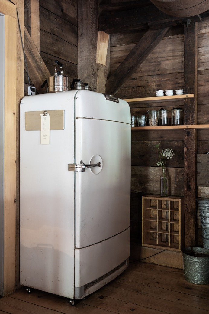 Even the fridge—a 1950's Frigidaire that French found on Uncle Henry's (Maine's version of Craigslist)—is out in the open.