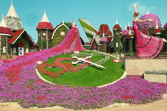 Floral Diva at Dubai Miracle Garden as the floral theme. This floral diva theme is located at the clock avenue section of the Dubai Miracle Garden. The diva seems to sing while her two partners are depicted as dancers that are dancing to her singing.