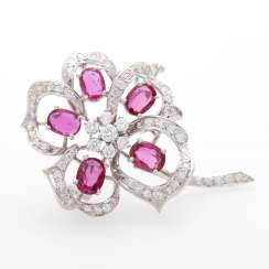 Flower brooch in a slightly curved shape