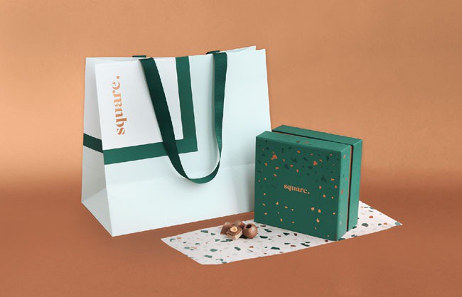 Square Chocolate Packaging Design - Mindsparkle Mag Premium handmade chocolate based in Dubai. The brand design highlight the luxury and sophistication of the product. #logo #identity #branding #design #color #photography #graphic #design #gallery #blog #project #mindsparkle #mag #beautiful #portfolio #designer