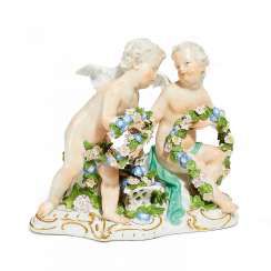 Two cupids with garlands of flowers. Meissen #Sets #Teasets #Porcelainsets #Antiqueplates #Plates #Wallplates #Figures #Porcelainfigurines #porcelain