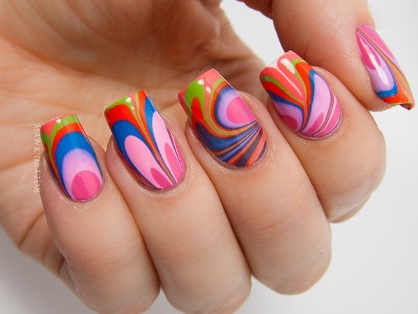 Ever wonder what would happen on your nails if you ever dipped them in rainbow? This is what you can get. Swirly, crazy and bold shapes of w