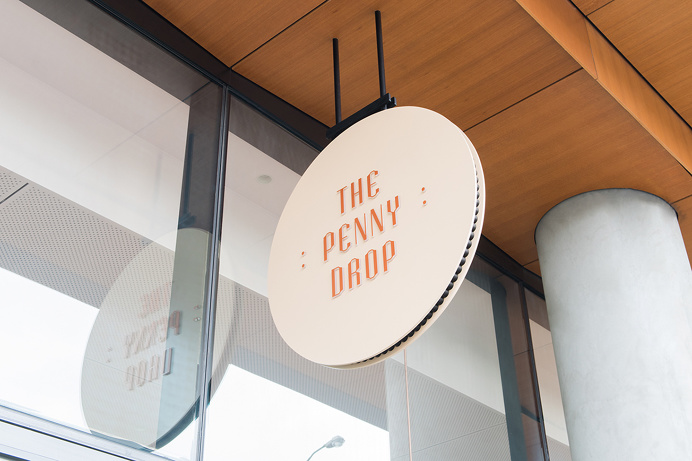 the penny drop cafe by pop and pac melbourne australia beautiful interior design branding logotype copper wood graphic modern coffee inspira