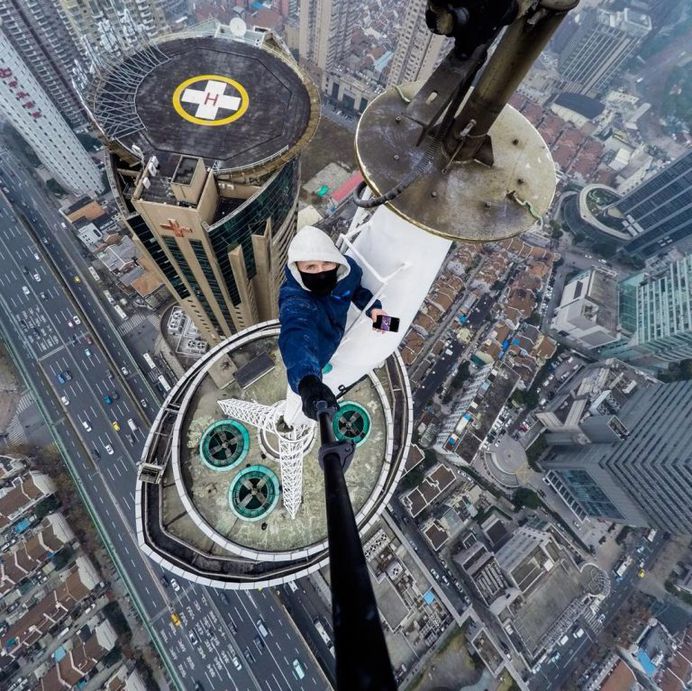 Daredevil Building Climber: Roooftop Photography by Andrej Ciesielski