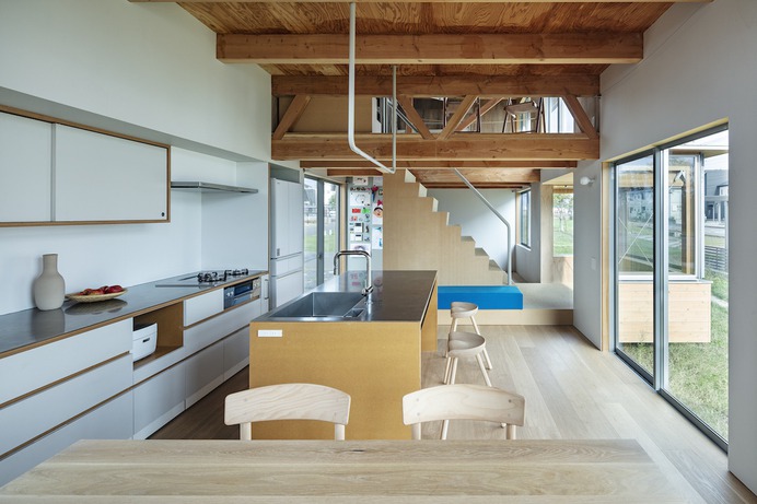 House in Field by Ship Architecture