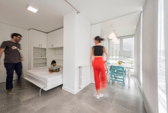 Sliding wall partitions for a adaptable home