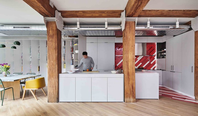 This Small Williamsburg Loft Elegantly Incorporates a Collection of 2,500 Books