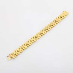 Gold bracelet with notes and coins, patterns,