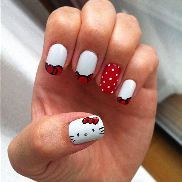 If you're looking for a simple French tip then this Hello Kitty design is perfect for you. The nails are tipped in white with an occasiona