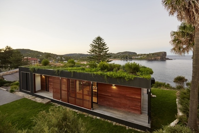 Prefab Beach House with Green Roof / ArchiBlox
