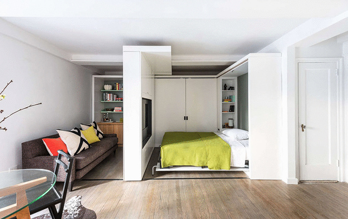 This apartment uses a mechanized moving wall to form different areas