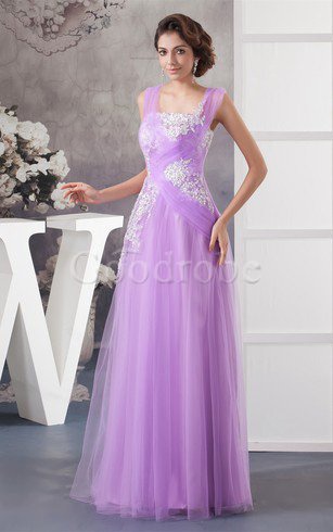 Robe de soirée longue textile en tulle bretelles spaghetti decoration en fleur