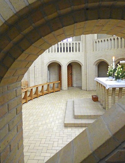 View through an opening in the staircase to the altar.