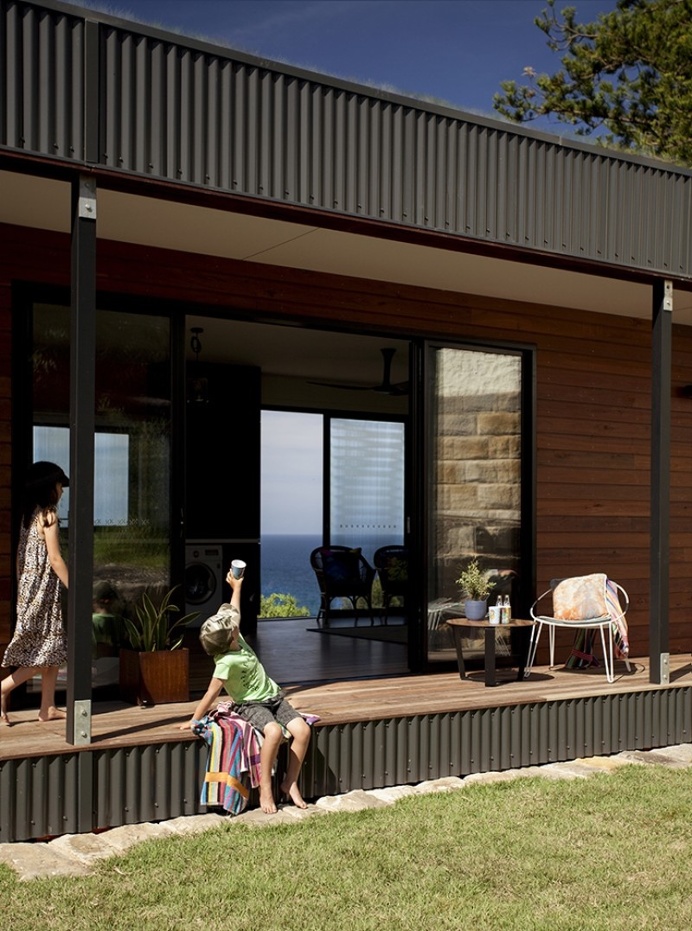 Prefab Beach House with Green Roof / ArchiBlox