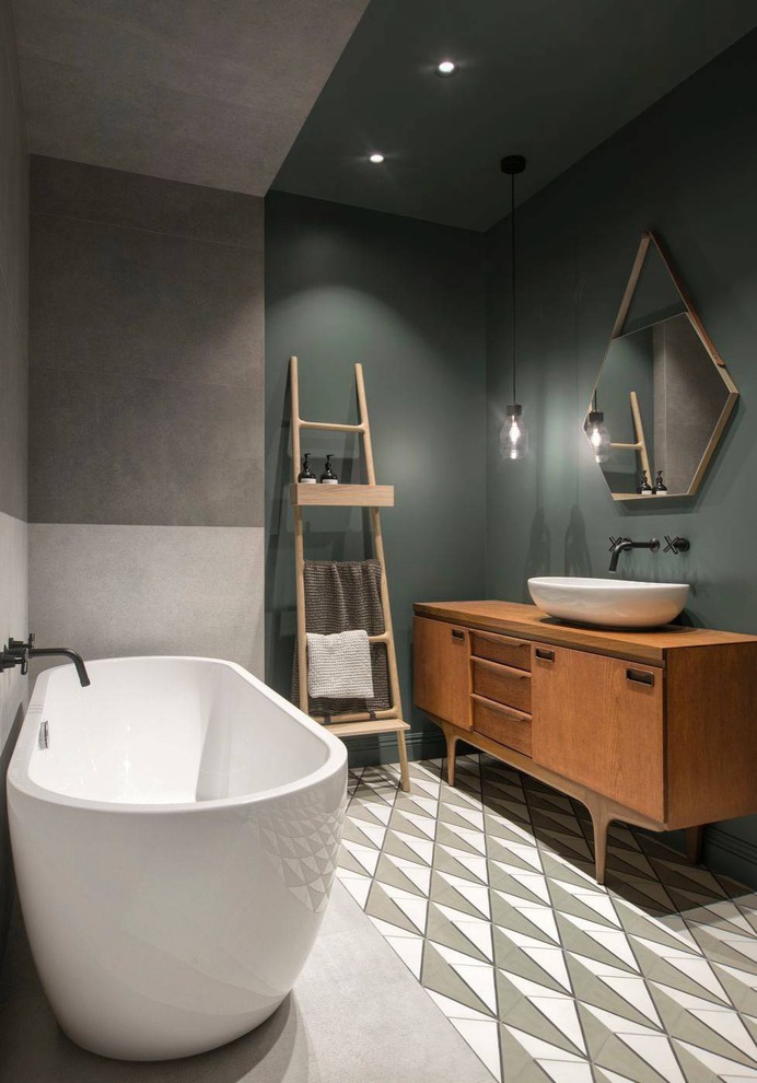 remodelproj: "Split finishes in bathrooms - Dark Paint & Tile on one side / Concrete & Black metal on the other "
