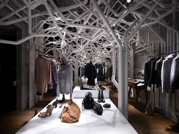 Nature Factory / Suppose Design Office #store #white #pipe #tree