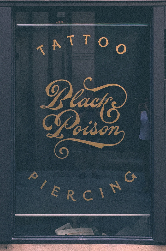 Black Poison. Reverse glass signpaint.