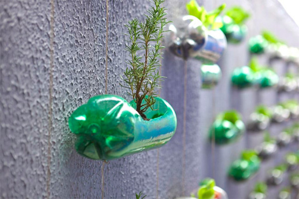 Urban Vertical Garden Built From Hundreds of Recycled Soda Bottles #guerillia #plant