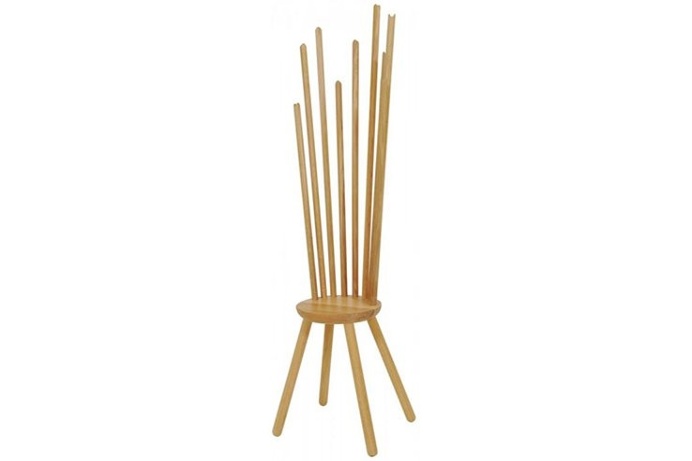 This dual-purpose chair is the perfect place to get ready to go out and the perfect place to hang your hat and coat when you come home. #des