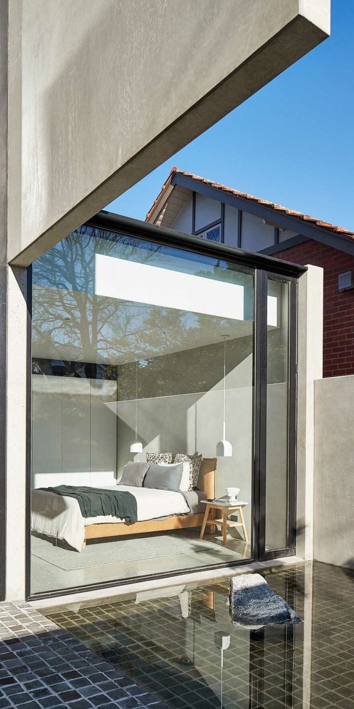 Minimalist Modern House Designed to Expose the Beauty of Raw Concrete