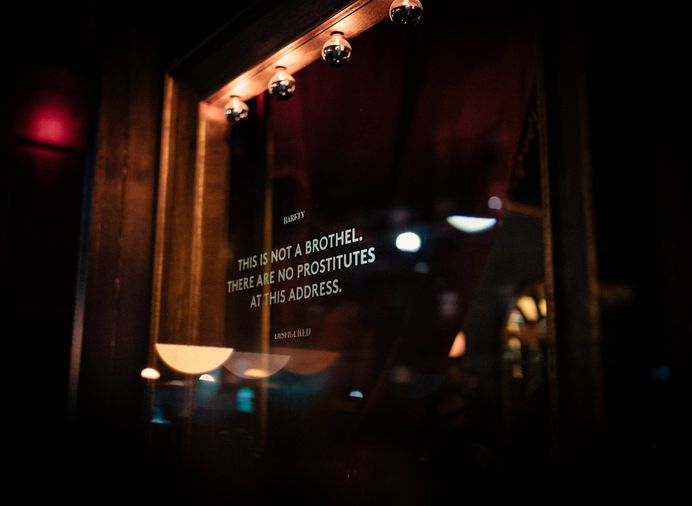 Barely Disfigured Window Signage, Brooklyn, New York