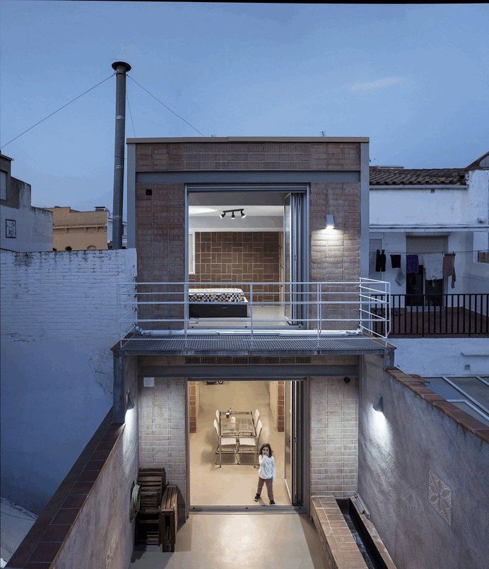 Blacksmith Workshop Turned into a Family Home in Badalona, Spain