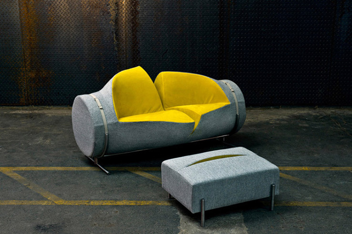 This unique sofa and ottoman looks as though it has been slashed with a knife. #design #product #furniture