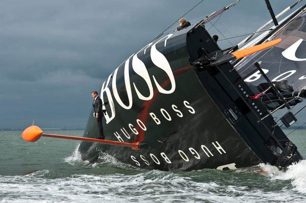 keel walk hugo boss suit boat sailing standing on rutter #sailing #suit #impossible