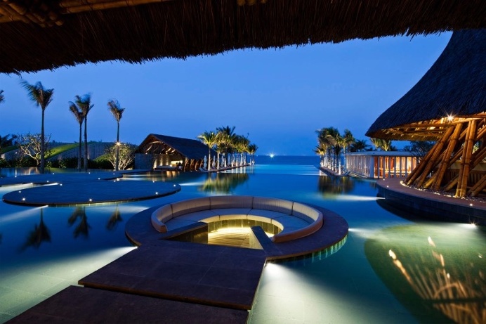 Beach bar in a tropical green resort complex