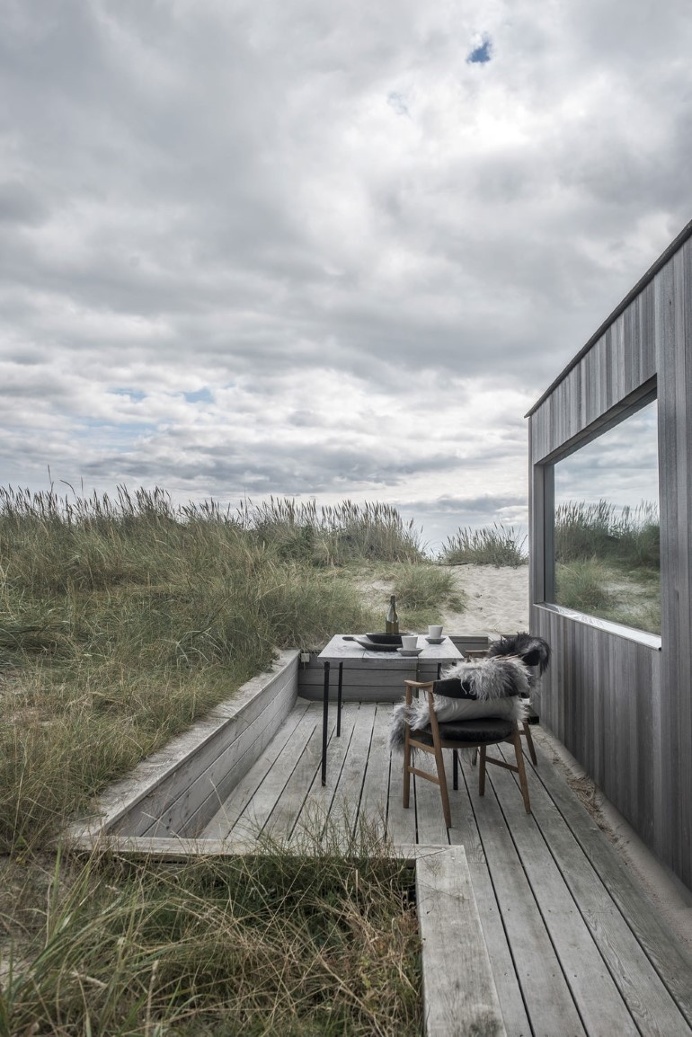 This Summer Cottage Was Designed as a Solid Wooden Block