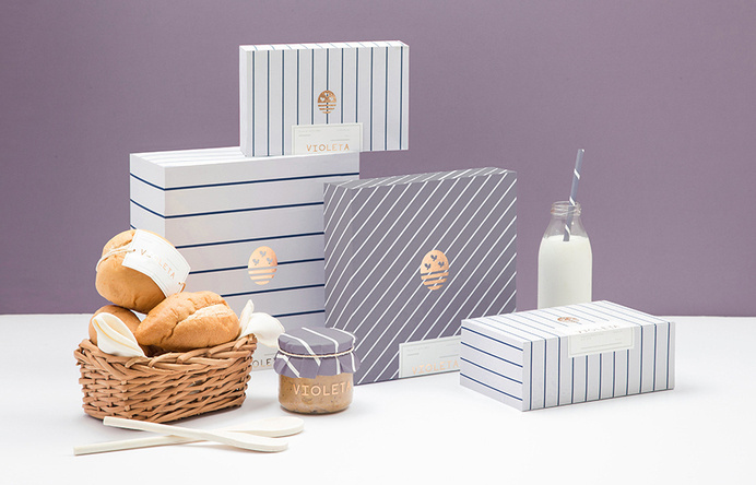Logo and packaging with copper foil detail designed by Anagrama for traditional Argentinian bakery Voleta #gg