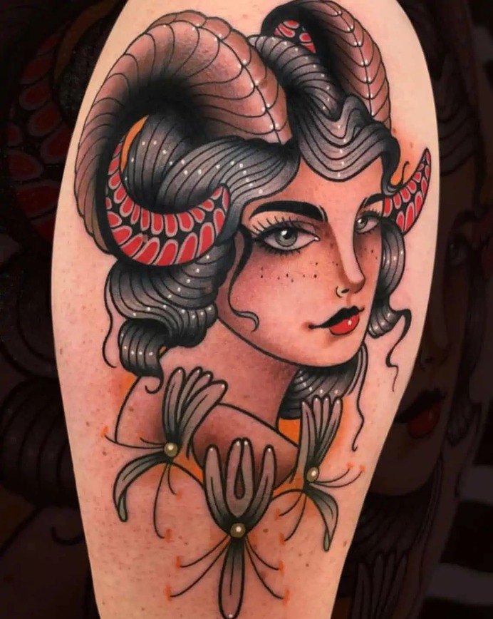 aries tattoo of girl with ram horns