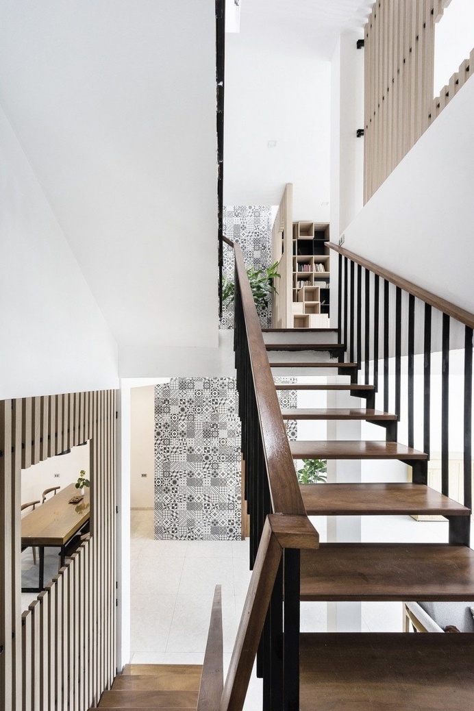 DANstudio Renovates House in Hanoi with Green Balconies Facade 6